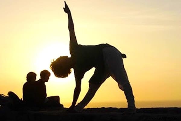 8 Yoga Poses Recommended by Expert Instructor Sarah Ezrin for Deeper Sleep