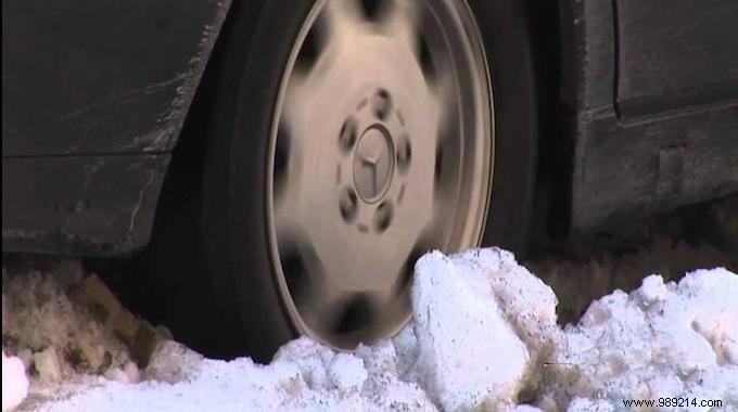How to Free Your Snow-Stuck Car: Proven Sand Trick to Stop Spinning Wheels