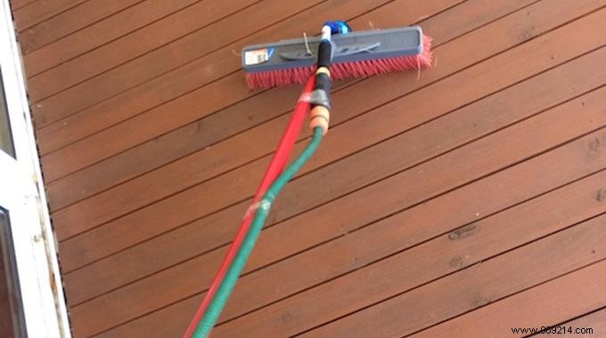 Effortless Wooden Deck Cleaning: The Hose-and-Broom Trick That Works