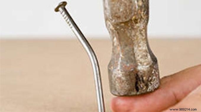 Safe DIY Hack: Hammer Nails Without Smashing Your Fingers Using a Comb