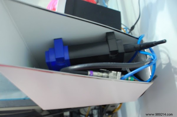 Smart DIY Hack: Hide Your Modem or Router in a Magazine Rack for a Tidy Desk