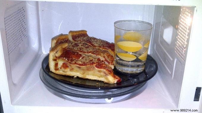 Reheat Pizza in the Microwave for Perfect Crispy Results: The Simple Water Glass Trick