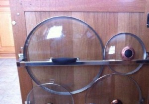 The Smartest Way to Organize Pot and Pan Lids: A Towel Rack Cabinet Hack