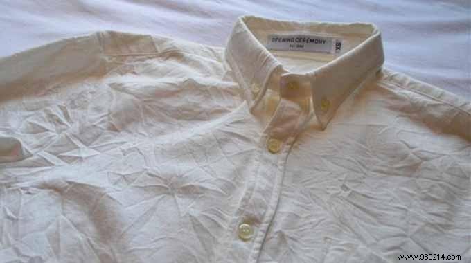 Genius Packing Hack: Protect Shirt Collars with Your Belt During Travel