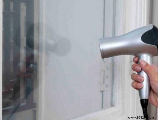 Cut Heating Costs with DIY Plastic Window Overglazing Film