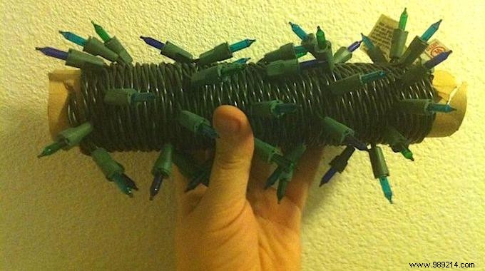 Store Christmas Garlands Tangle-Free Using Empty Wrapping Paper Rolls