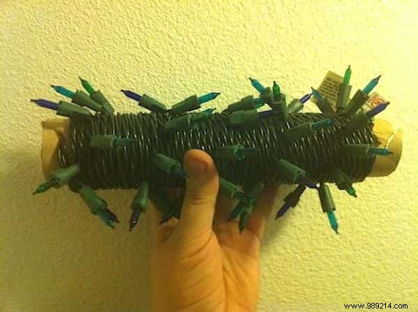 Store Christmas Garlands Tangle-Free Using Empty Wrapping Paper Rolls