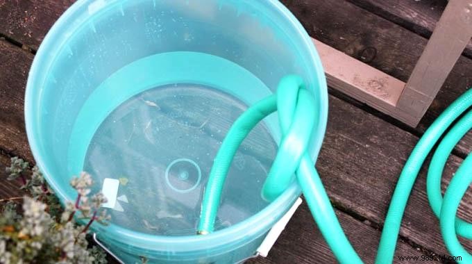 Pro Gardening Hack: Fill Buckets with a Hose Without the Slippage
