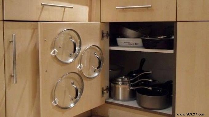 Smart Kitchen Hack: Organize Pot Lids on Cabinet Doors to Free Up Space