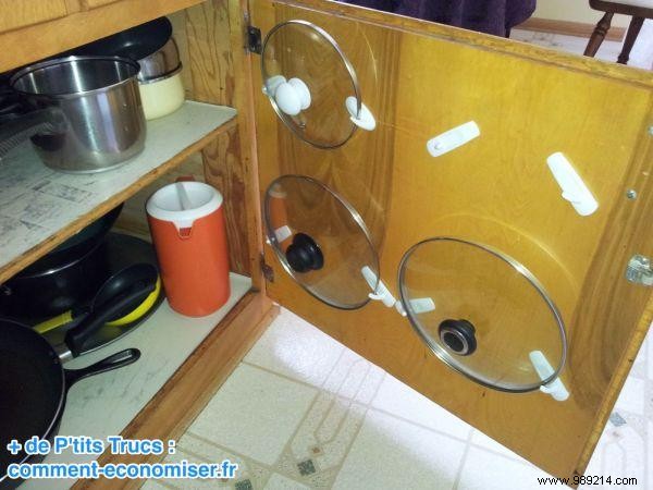 Smart Kitchen Hack: Organize Pot Lids on Cabinet Doors to Free Up Space