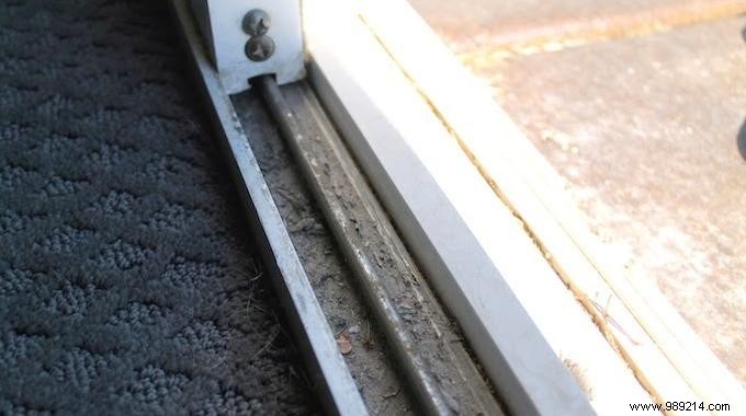 Effortless Way to Clean Sliding Patio Door Tracks with White Vinegar