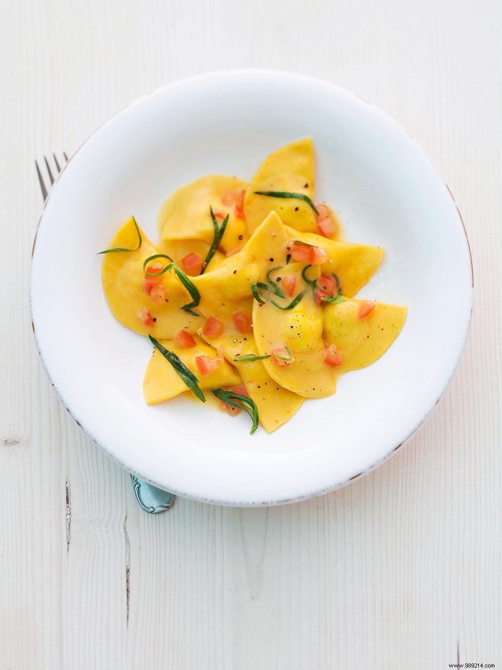 Homemade Smoked Trout Ravioli with Tomato-Tarragon Butter Sauce