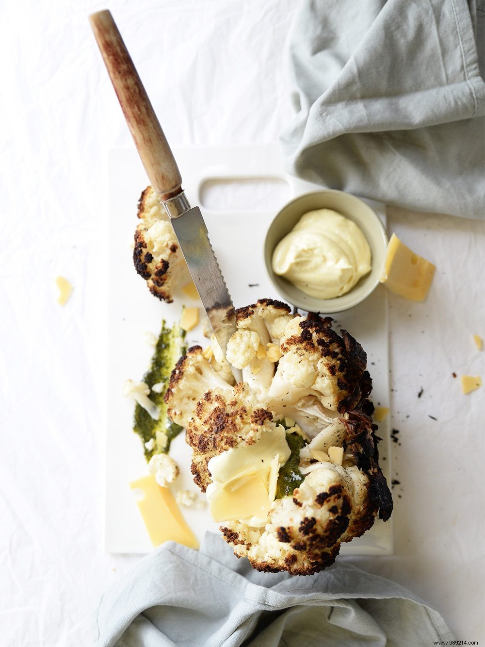 Grilled Whole Cauliflower with Vibrant Green Herb Sauce: A BBQ Must-Try
