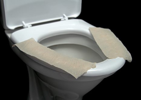 Is Covering Public Toilet Seats with Toilet Paper Really Necessary?