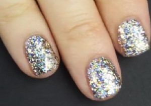 Pro Tip: Achieve Bottle-Perfect Glitter Nails with This Simple Sponge Technique
