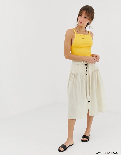 Spring s Must-Have: Button-Front Skirts Reviving 1970s Style