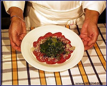 Argentine Torillon Carpaccio with Chopped Hazelnuts, Black Sesame, and Fresh Herb Salad