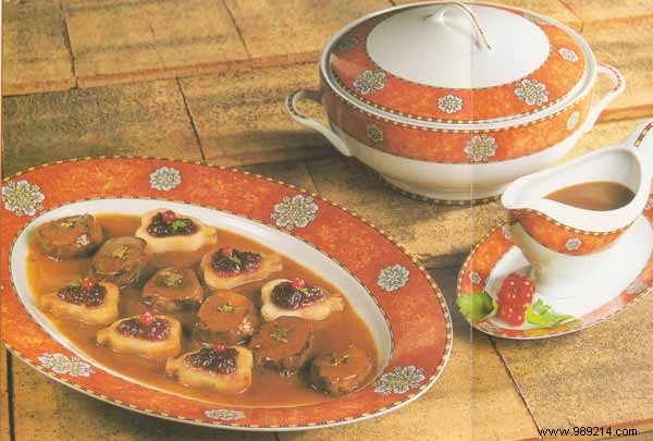 Venison Noisettes with Poached Pears, Cranberries, and Velvety Venison Sauce