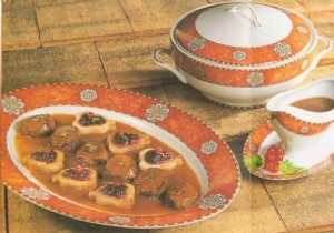 Venison Noisettes with Poached Pears, Cranberries, and Velvety Venison Sauce