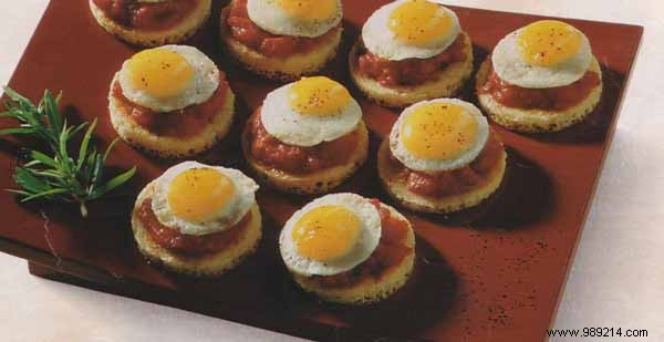 Quail Eggs on Mini Blinis with Tomato Confit