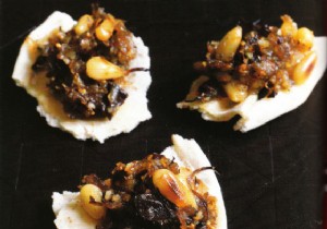 Savory Pastilla-Style Bites: Duck Confit with Dark Chocolate and Nuts