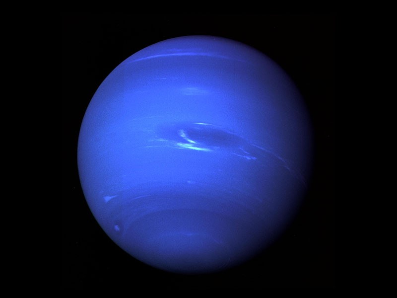 Why Uranus Looks Pale While Neptune Glows Blue: The Atmospheric Mystery Explained