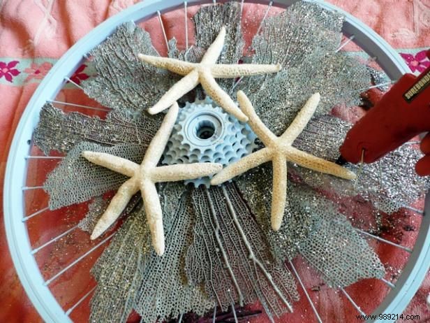 DIY Beach Wreath: Upcycle a Bike Rim with Coral Fans and Starfish
