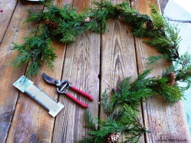 DIY Rustic Northern Woods Wreath: Upcycled Picket Fence with Evergreen Garland