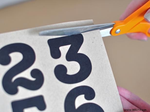 Elegant DIY Table Numbers: Painting Custom Numbers on Glass Bottles