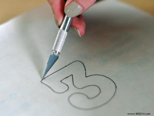 Elegant DIY Table Numbers: Painting Custom Numbers on Glass Bottles