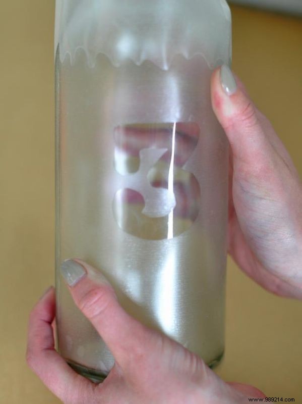 Elegant DIY Table Numbers: Painting Custom Numbers on Glass Bottles
