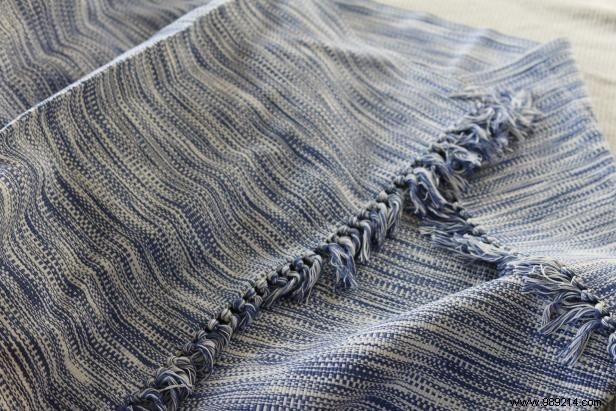 Expert Guide: Recover an Ottoman with a Flat Weave Rug – Step-by-Step