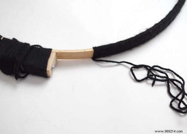 Craft a Spooky Yarn-Wrapped Crescent Moon Wreath for Halloween: Easy DIY by Jennifer Perkins