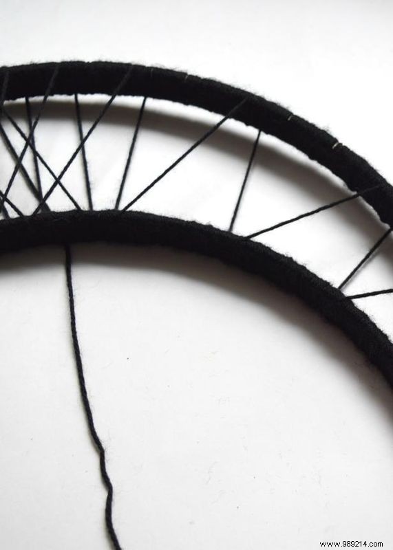 Craft a Spooky Yarn-Wrapped Crescent Moon Wreath for Halloween: Easy DIY by Jennifer Perkins