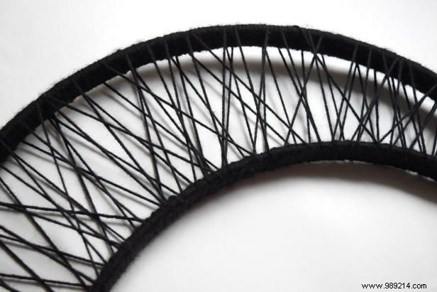 Craft a Spooky Yarn-Wrapped Crescent Moon Wreath for Halloween: Easy DIY by Jennifer Perkins